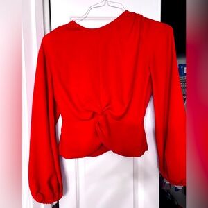 Express size S red blouse.  Balloon sleeves with elastic waist.  100% polyester